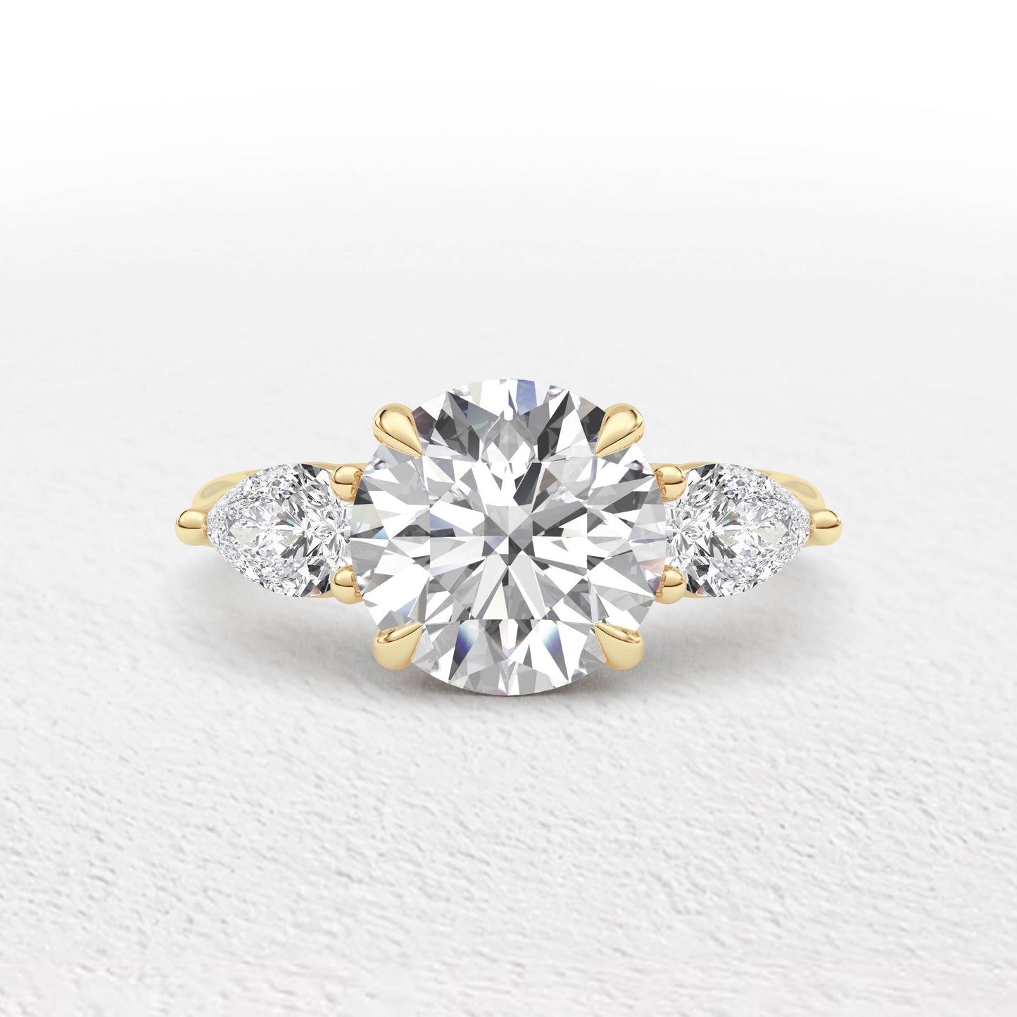 Serena   3.7ct Round and Pear Cut 3 Stone Ring