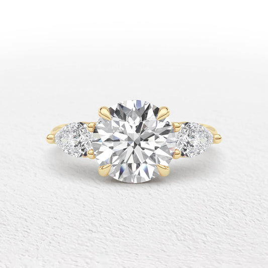 Serena   3.7ct Round and Pear Cut 3 Stone Ring