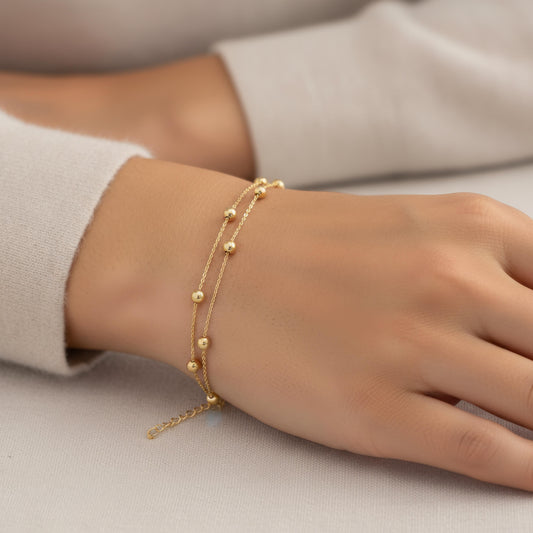 9CT YEL GOLD LADIES 2 STRAND BEADED BRACELET