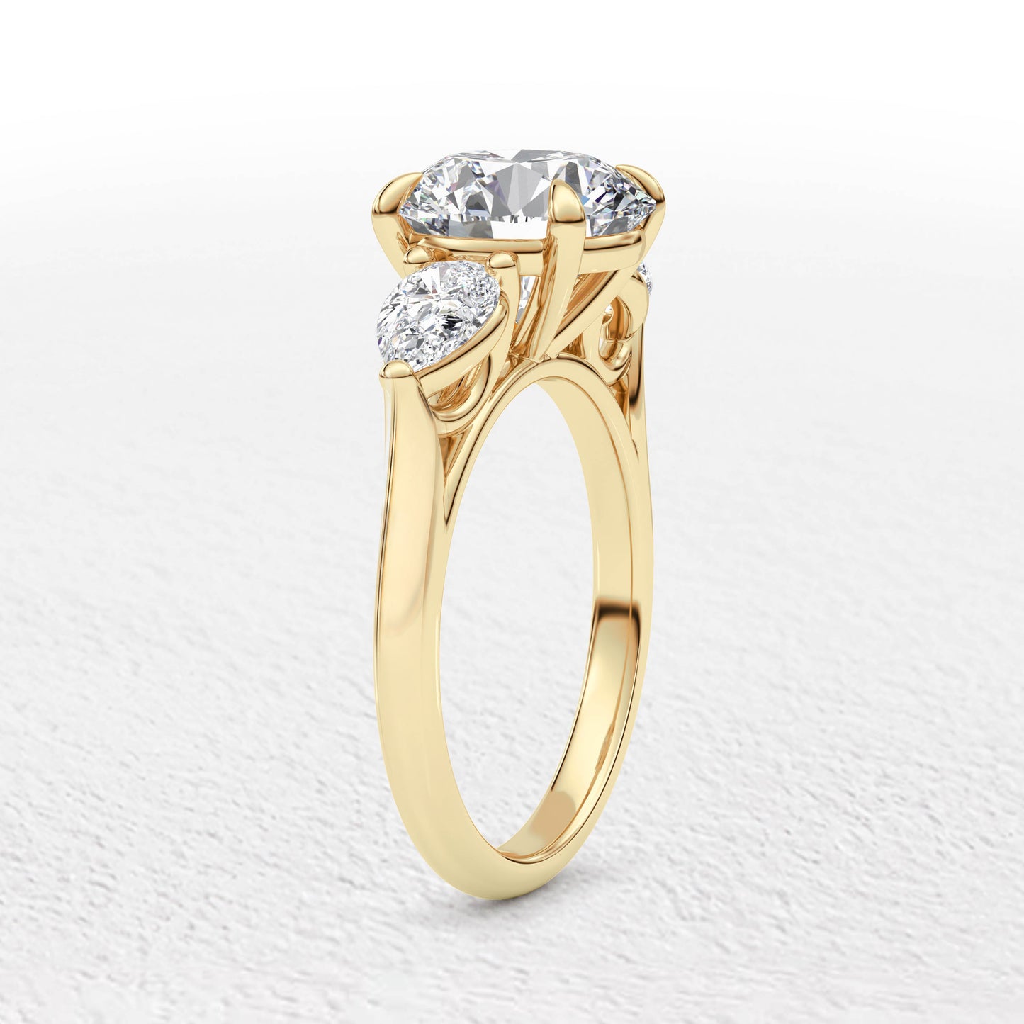 Serena   3.7ct Round and Pear Cut 3 Stone Ring