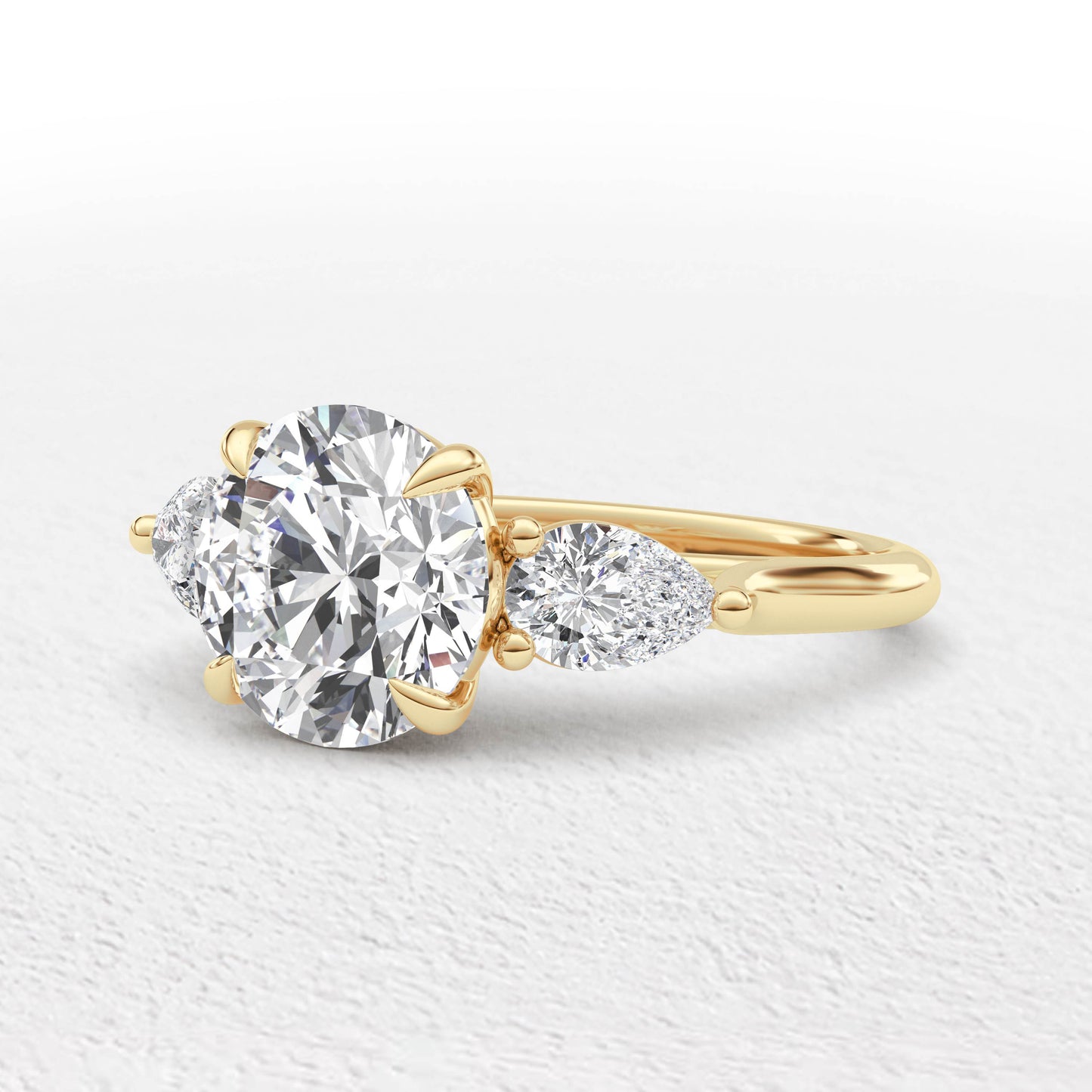 Serena   3.7ct Round and Pear Cut 3 Stone Ring